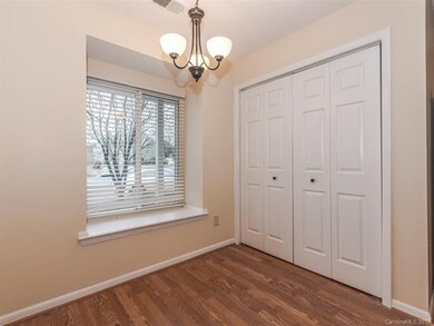 Breakfast area features large window, updated ligh