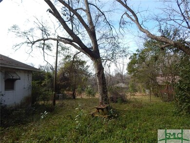 Remove the tree and flip this yard...