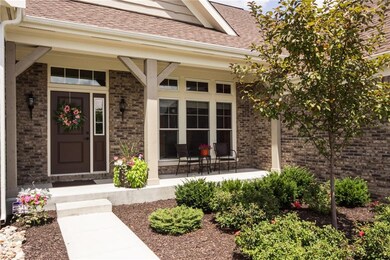 Covered front porch is perfect for your morning coffee and newspaper and greeting guests.