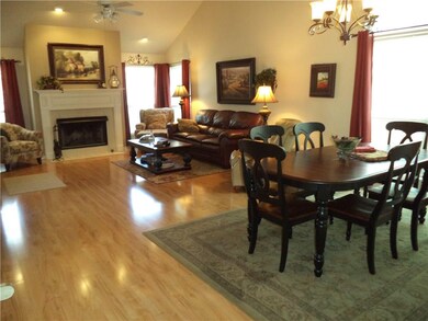 Spacious living/dining with wood burning fireplace