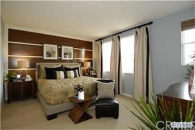 Spacious master suite, as shown in the model