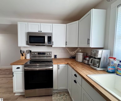 7638 Skegemog Point Rd, Williamsburg, MI 49690 - photo 3