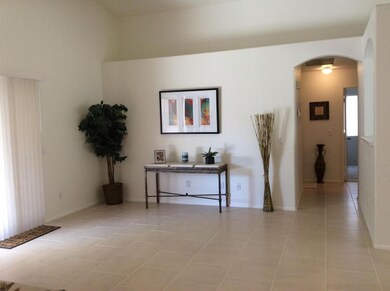 Great room adorned w/plant shelves