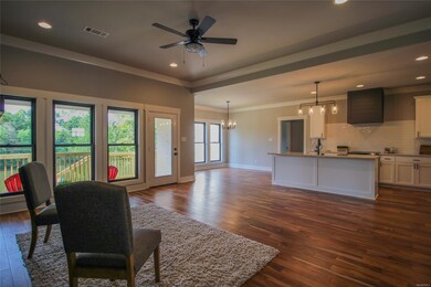 Living Room overlooking Kitchen (Open Concept)