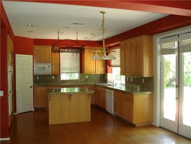 Gourmet connoisseurs eat-in kitchen with maple cab
