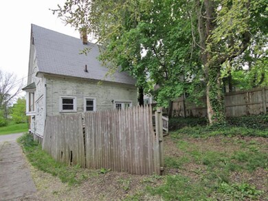 263-195156-rear view of yard and fence