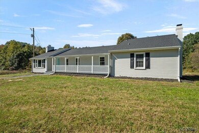Single story home with a front yard