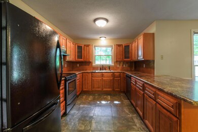 Tile floors and glass panel cabinets add pizazz!