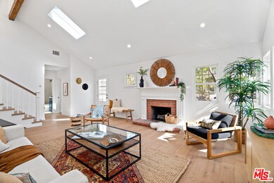 Open living area with lofted ceilings