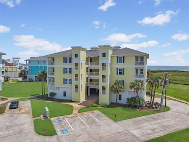 The building features coastal architecture with easy access to parking and common areas, placing you within walking distance of the clubhouse, infinity pool, and beach crossover.