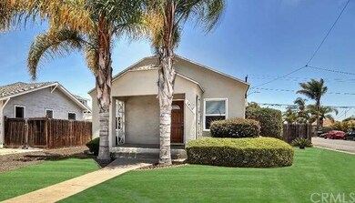 Front house has long driveway back to detached gar