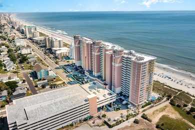 Aerial view with a view of the beach and a water v