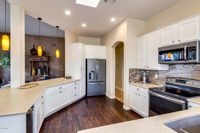 Kitchen opens to Living & Dining Rms