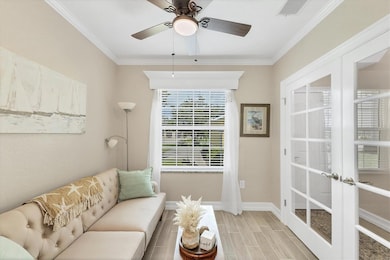 OFFICE WITH FRENCH DOORS, PORCELAIN TILE FLOOR, CEILING FAN & IMPACT WINDOW