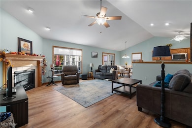 With vaulted ceiling and ceiling fan