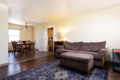 Living room open to dining and kitchen, bonus room