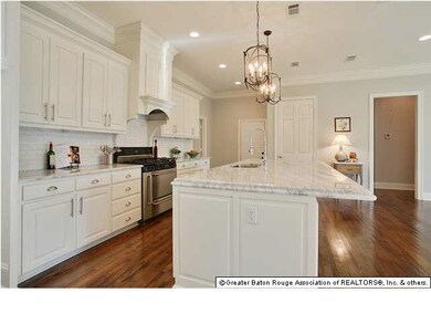 Kitchen has beautiful island with lots of seating,