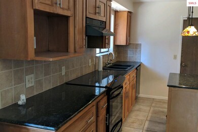 Upgraded Granite Counters and  Floors