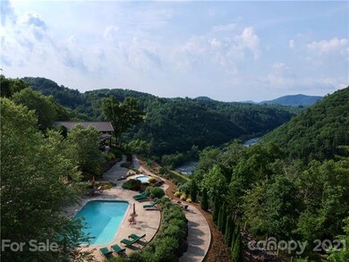 Relax by the pool while enjoying the peaceful surr