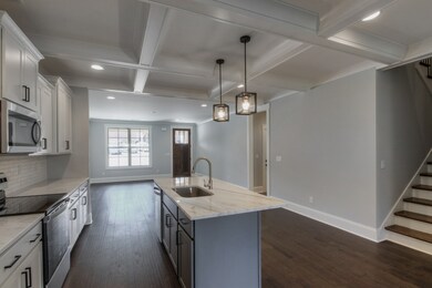 Pics are of the building next door. Floorplans are the same. Colors and finishes may vary. Finished pictures coming soon! 