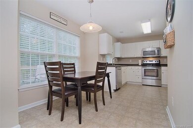 Breakfast area overlooks the back yard.