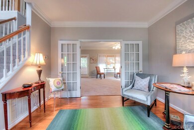 Glass French doors open your living space.