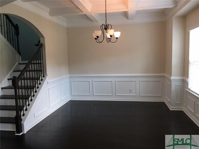 Formal dining just off foyer