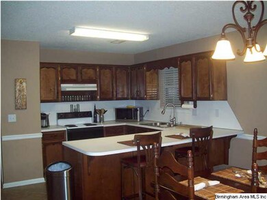 Sparkling Kitchen offers loads of cabinetry and co