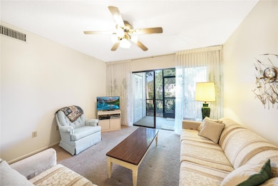 Living room with enclosed lanai