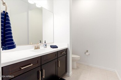 Powder Room is located next to Den.