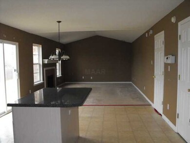 Nice open kitchen and den.