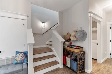 Hard wood stairs and downstairs laundry room