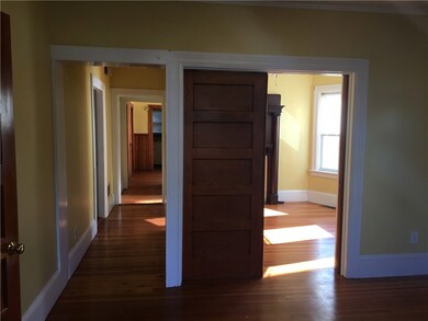 View of hallway and dining room from living room