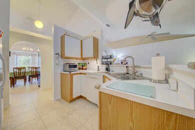 kitchen with opening to dining room