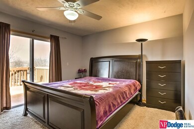 You are not seeing things. Master Bedroom has sliding doors to go out and enjoy deck that is the length of the house, with an amazing view! Beautiful sunsets