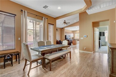 Front entry leads into formal dining area, with sl