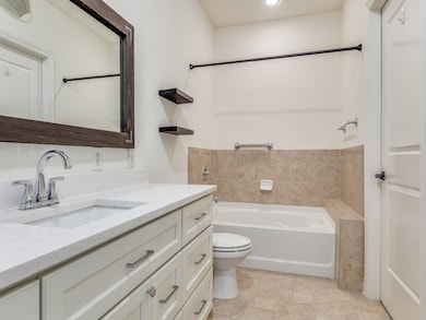 Bathroom include a full tub and a spacious shower
