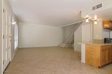 Living Room opens to Kitchen