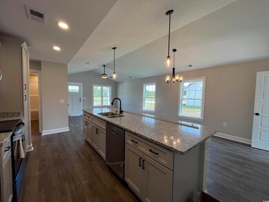 Kitchen with vaulted ceiling, ceiling fan with not