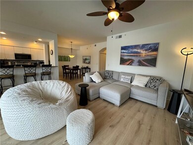 Living room featuring light hardwood / wood-style 