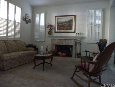 Formal living room with gas fireplace