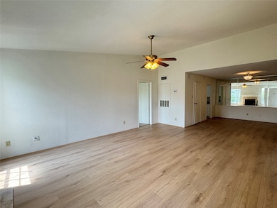 NEW luxury vinyl plank throughout the living room,