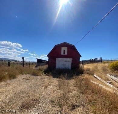 View of barn featuring a view of rural / pastoral