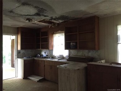 Kitchen with door to outside