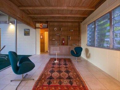 Living Room mid-century modern with built-in books