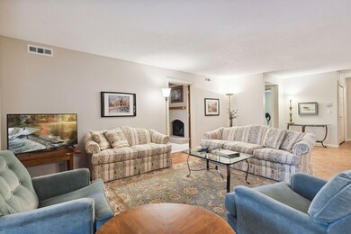 The den has a fireplace with a hearth and mantle.  The den can serve multiple purposes if entertaining a large group; additional seating, bar set-up,  etc.