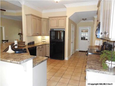 Kitchen is a great size with lots of cabinetry and counter space.