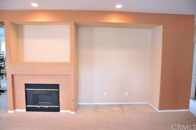 Living room fireplace/entertainment area