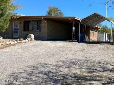 Front with 2 carports
