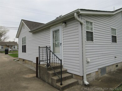 Side door that leads to inside utility and exterio